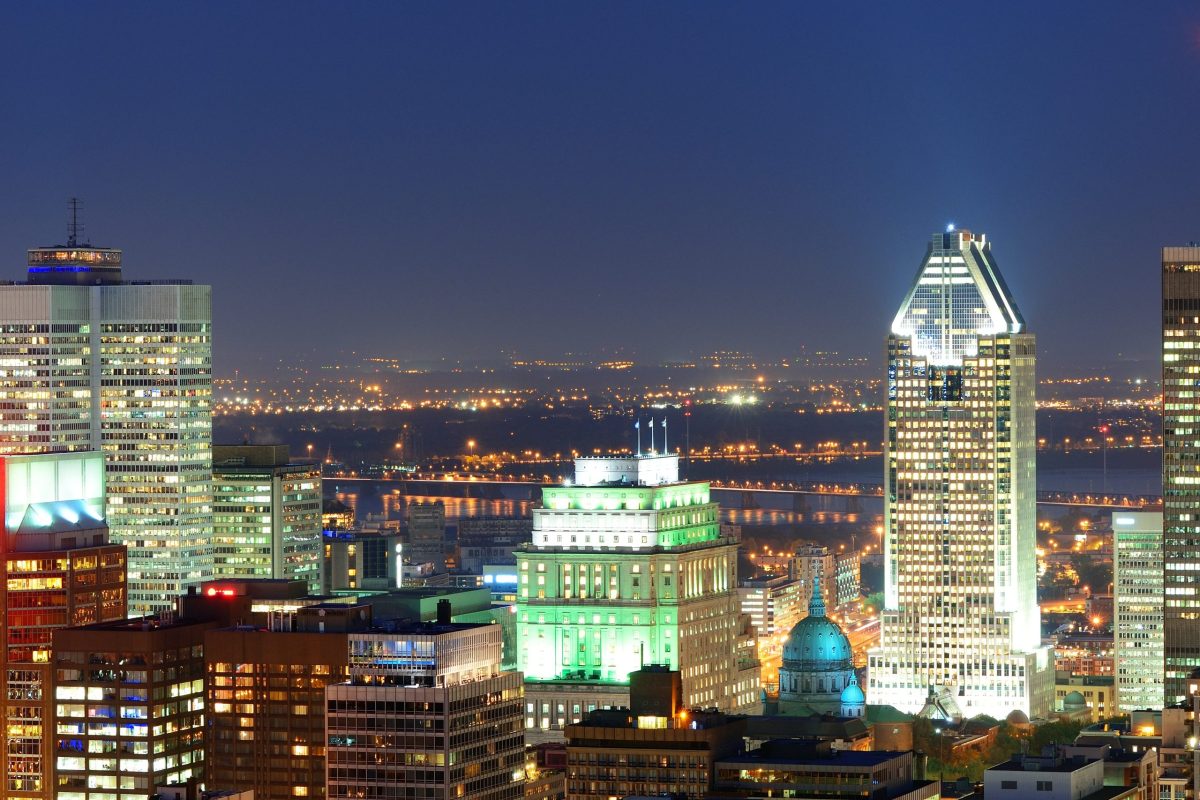 Montreal at dusk with urban skyscrapers viewed from Mont Royal